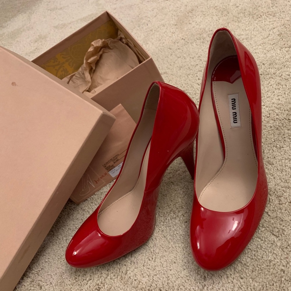 Wonderful Miu Miu red shoes.